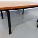 Suite of two vintage modernist Isa coffee tables in teak and black metal from the 60s