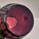 Beautiful Doyen Art Deco vase in burgundy glass.