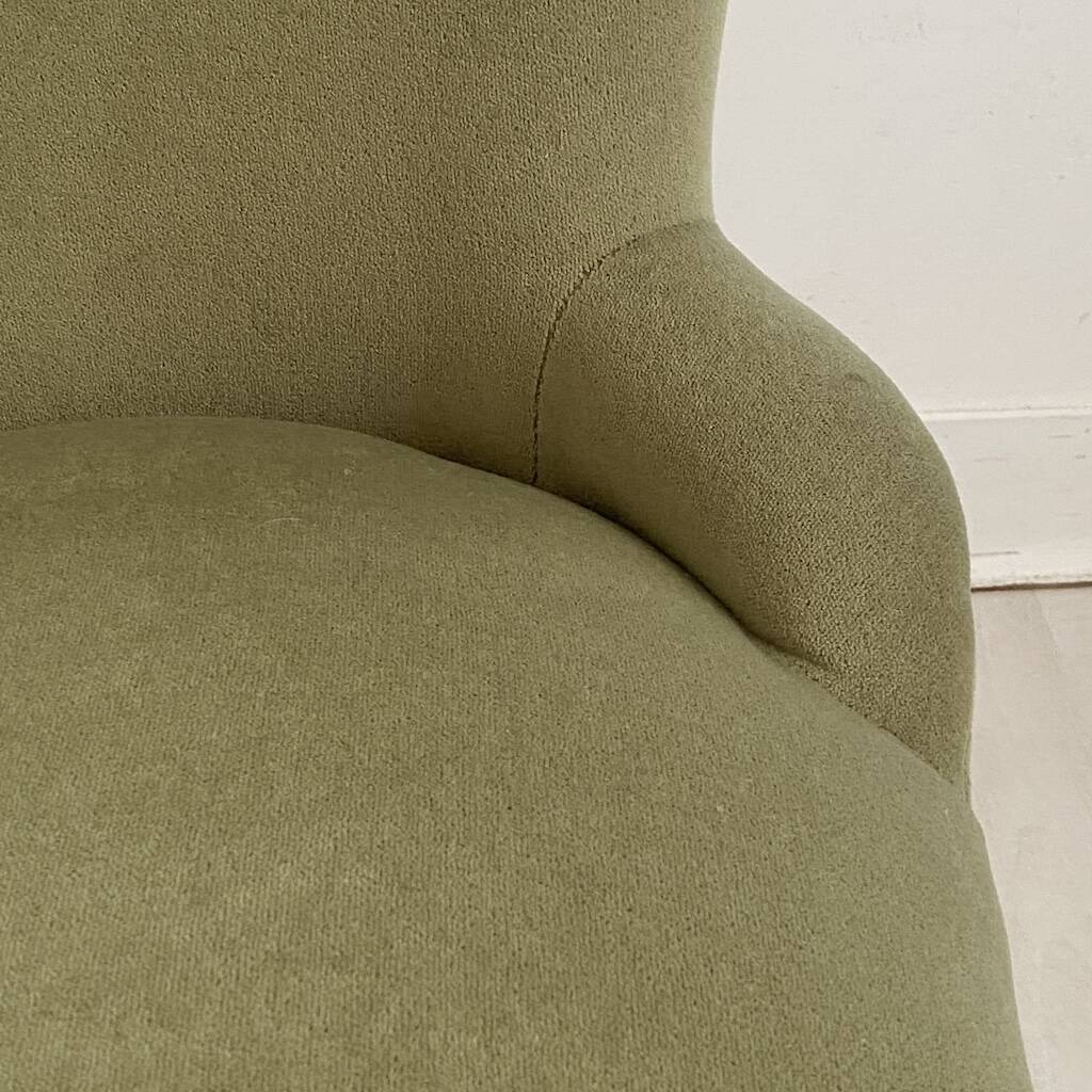 Small green velvet tub chair