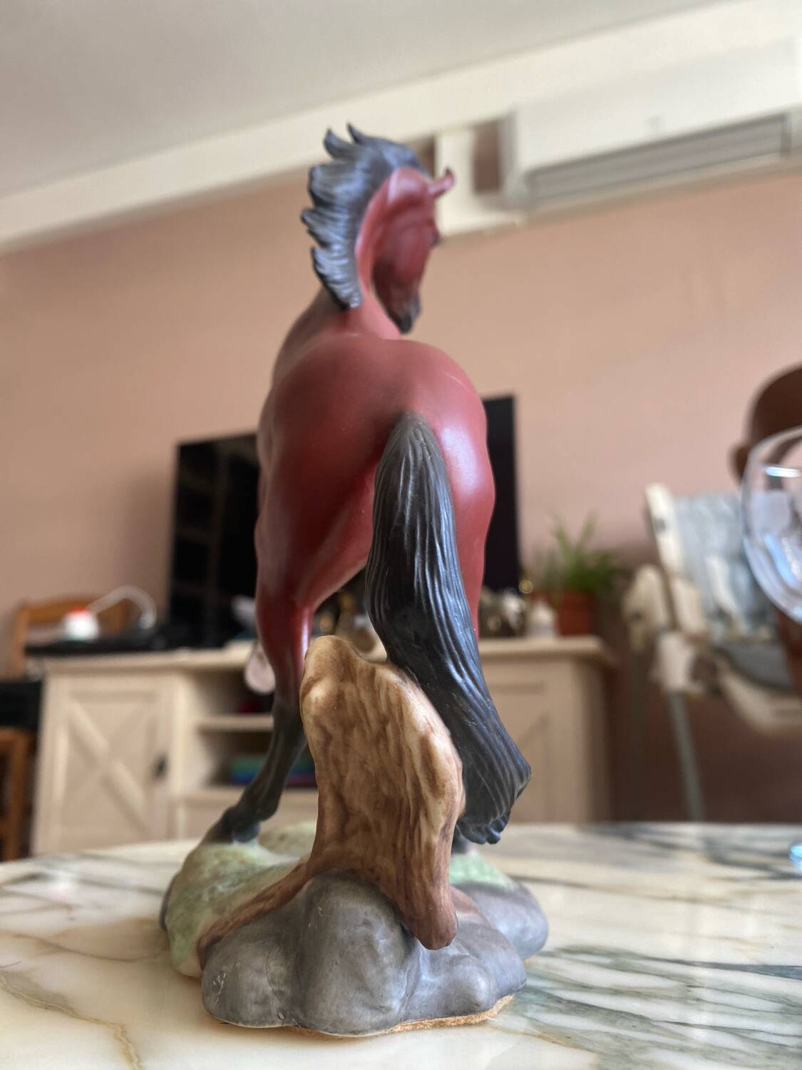 Porcelain horse statue (the red pony)