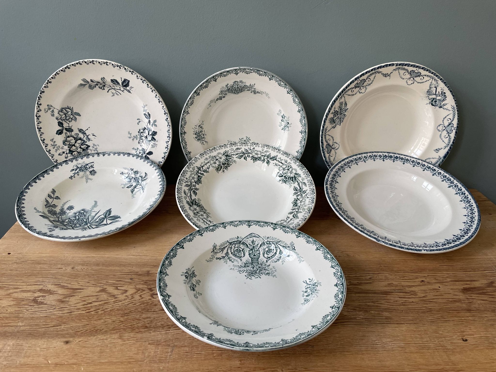 Set of 7 mismatched hollow plates Terre de Fer XIXth