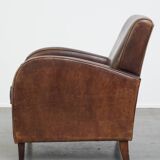 A stately, well-preserved, and comfortable sheepskin armchair
