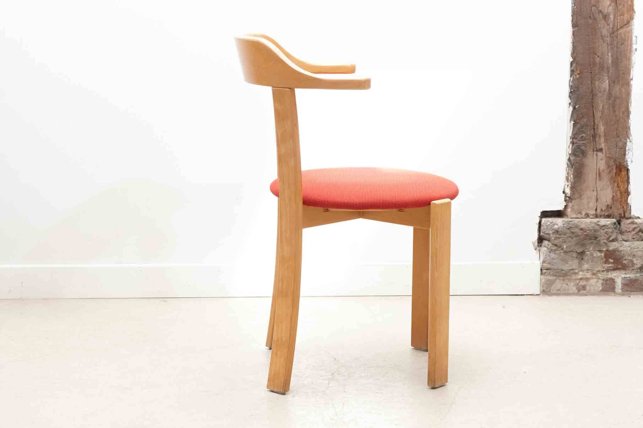 Horn chair upholstered in red and beech
