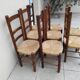 8 vintage straw chairs in the style of Charlotte Perriand.