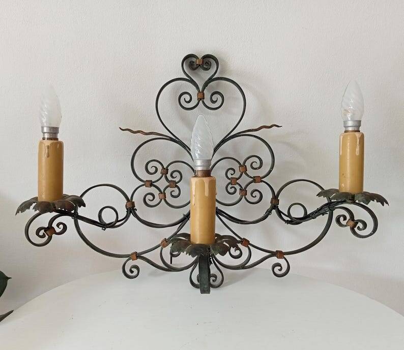 Antique wrought iron wall light from the 50s