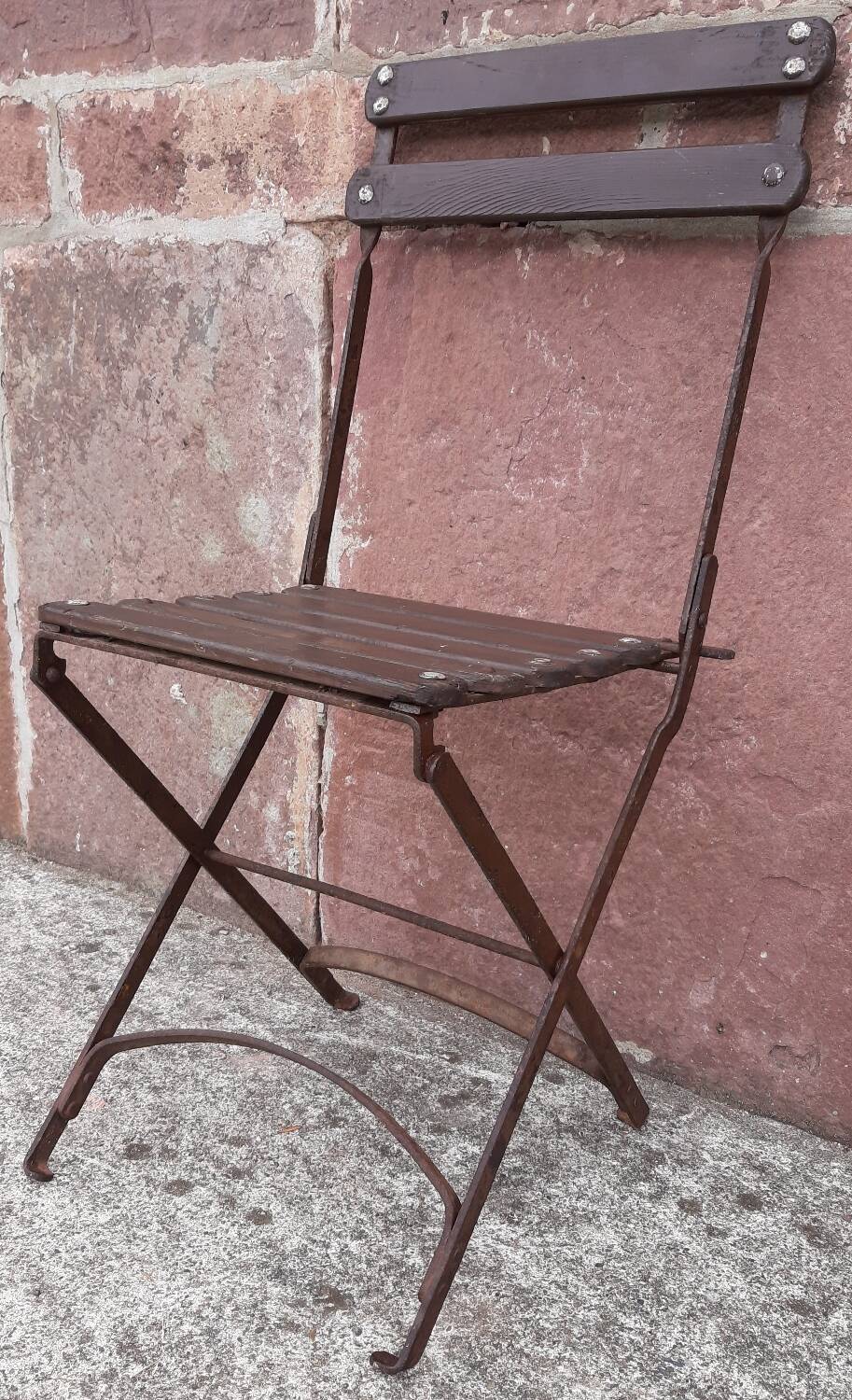 Foldable wrought iron chair