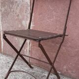 Foldable wrought iron chair
