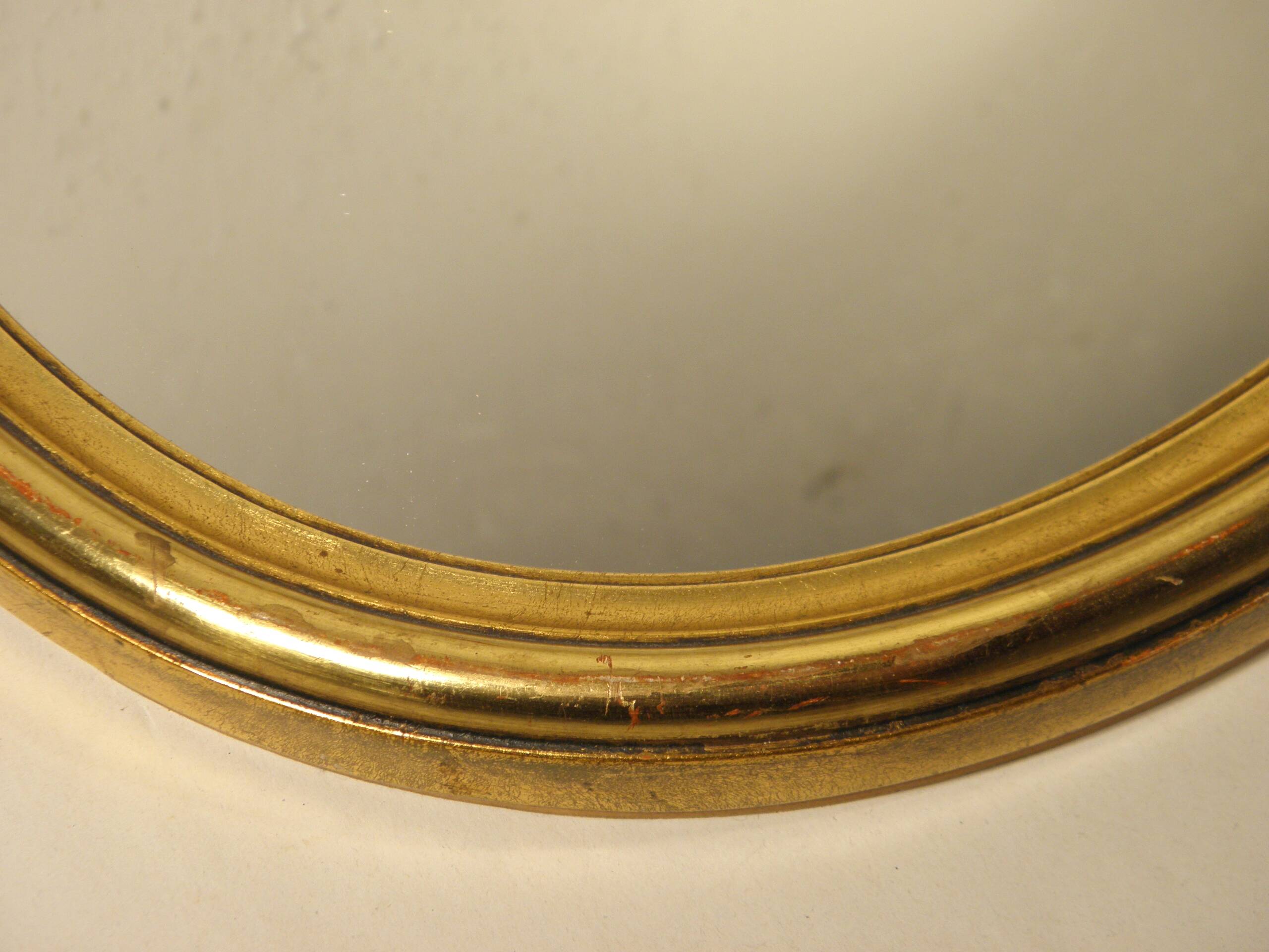 Oval gilded wood mirror 45 x 34