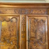 Wedding wardrobe of the Bressan country in walnut and walnut magnifying glass dated 1850