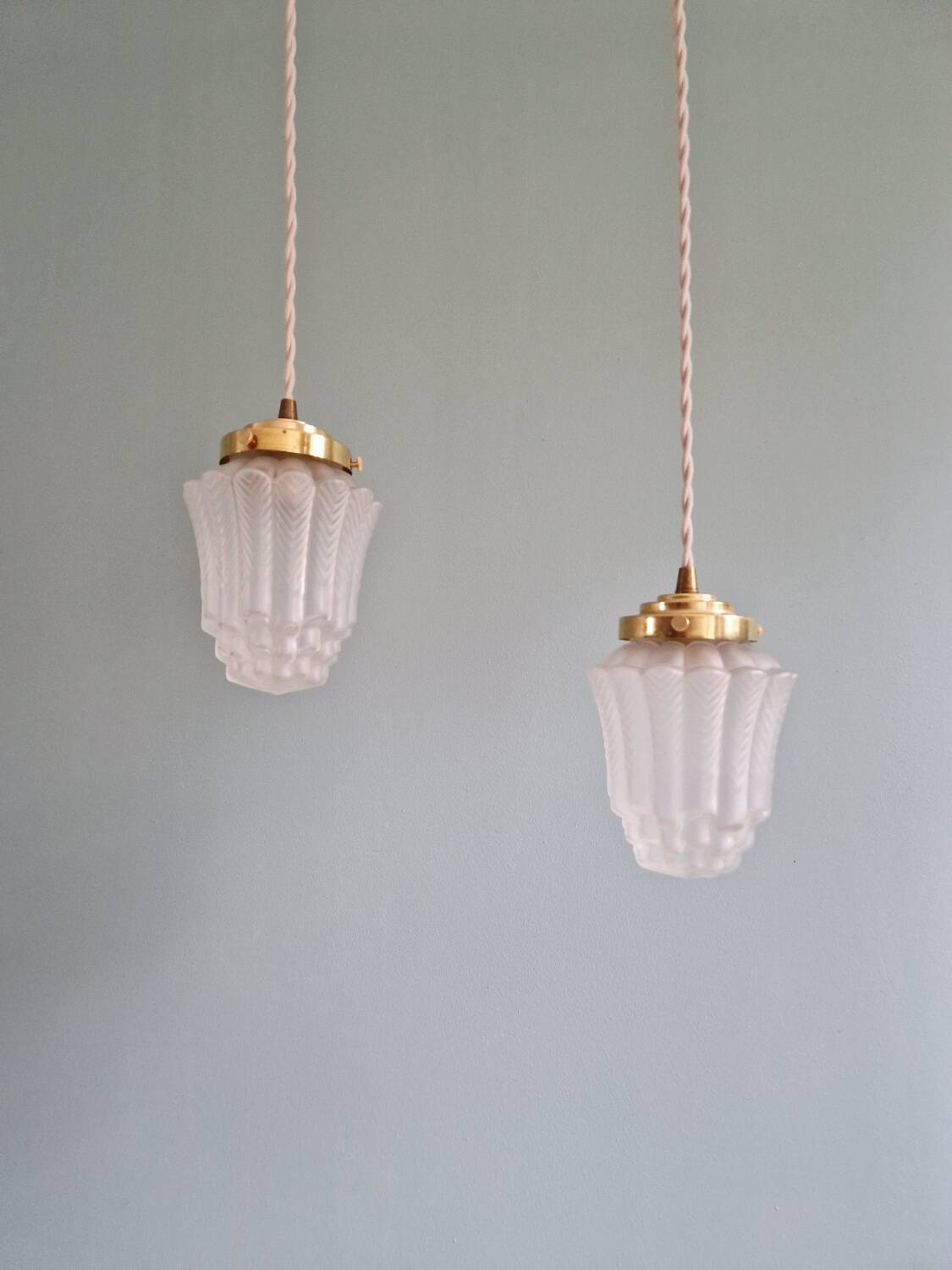 Pair of Art Deco Skyscraper-style pendant lights in frosted glass, 1920-30