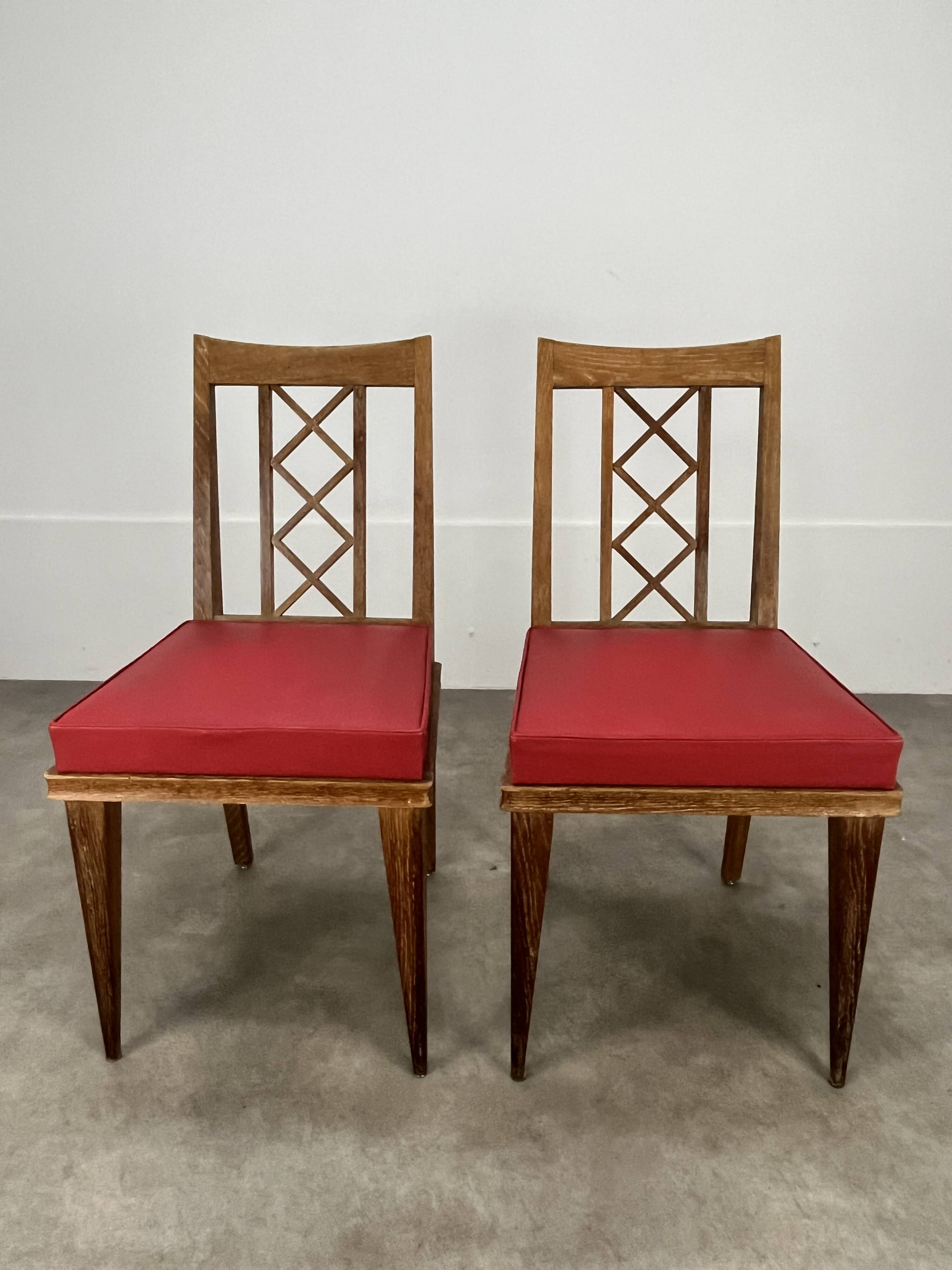 Pair of 1950s wooden cross-braced chairs