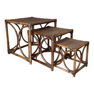 Set of 3 rattan nesting tables. 1960.