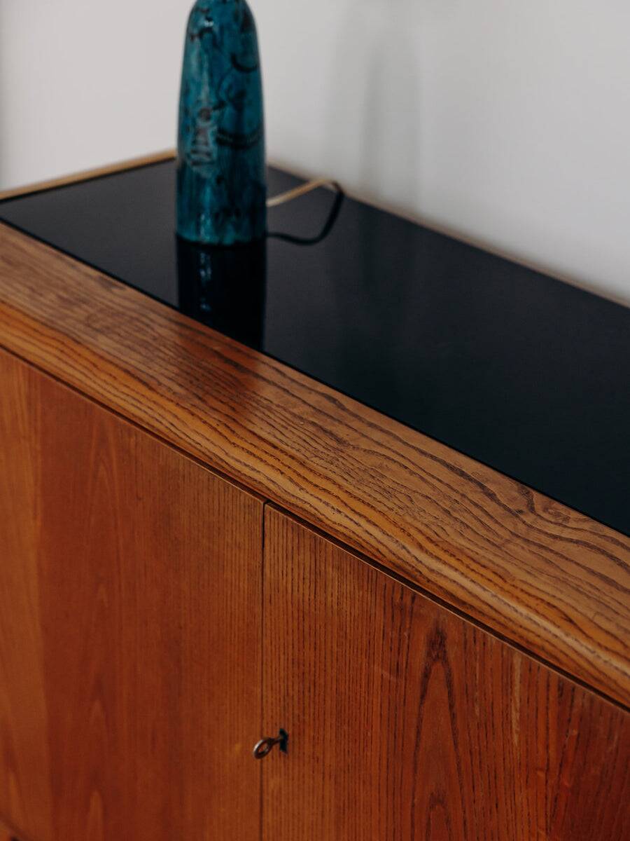 Low wooden sideboard by Bohumil Landsman and Hubert Nepozitek