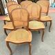 Suite de six chaises de style Régence en chêne massif XX siècle