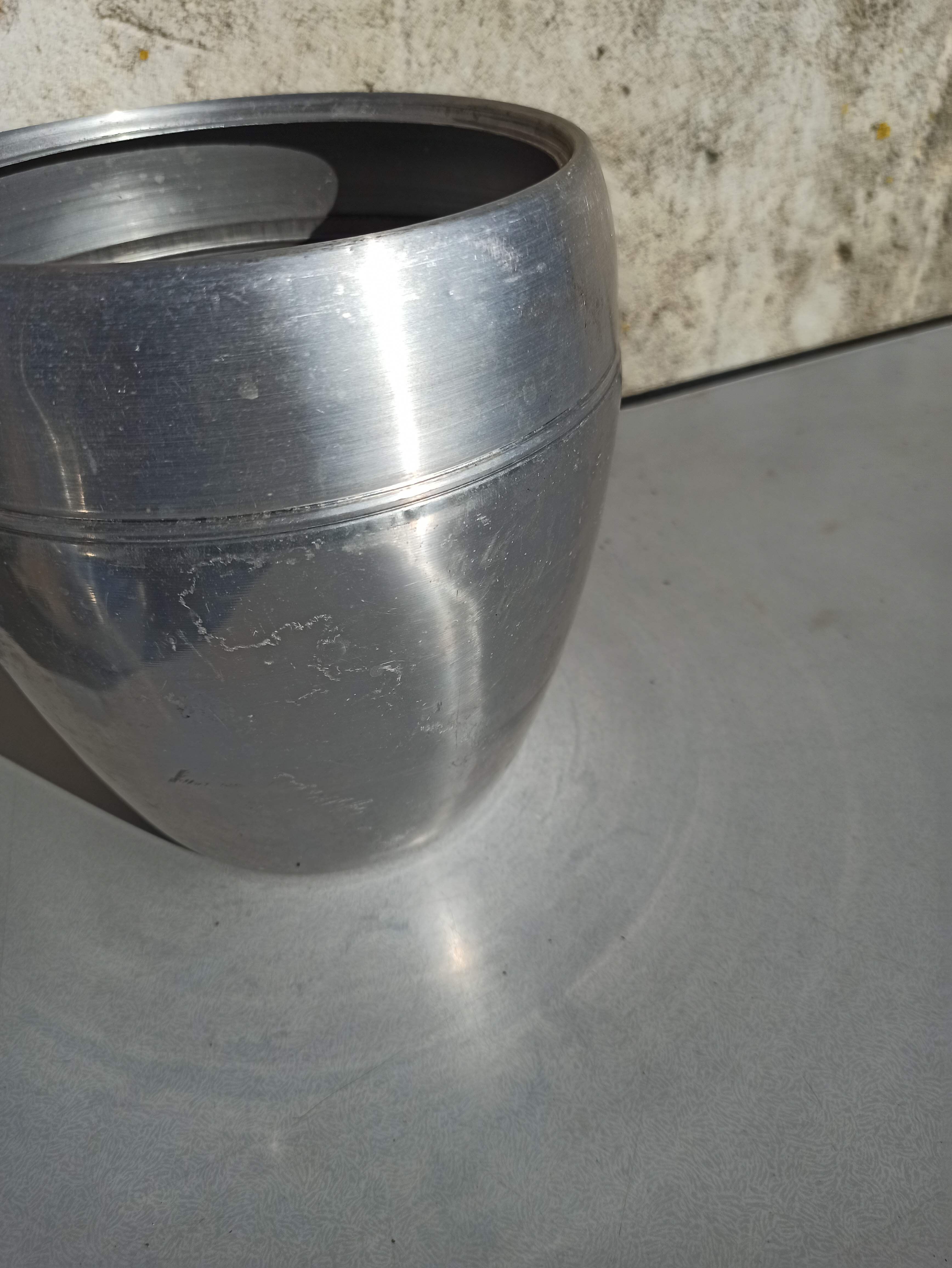 Old ice bucket ice cube in the shape of aluminum pear