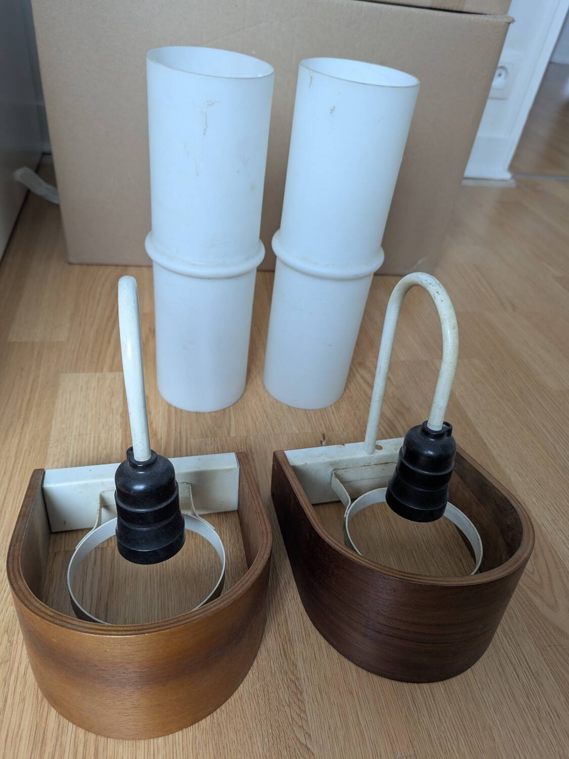 Pair of Louis Kalff NX40 teak and glass wall lights for Philips