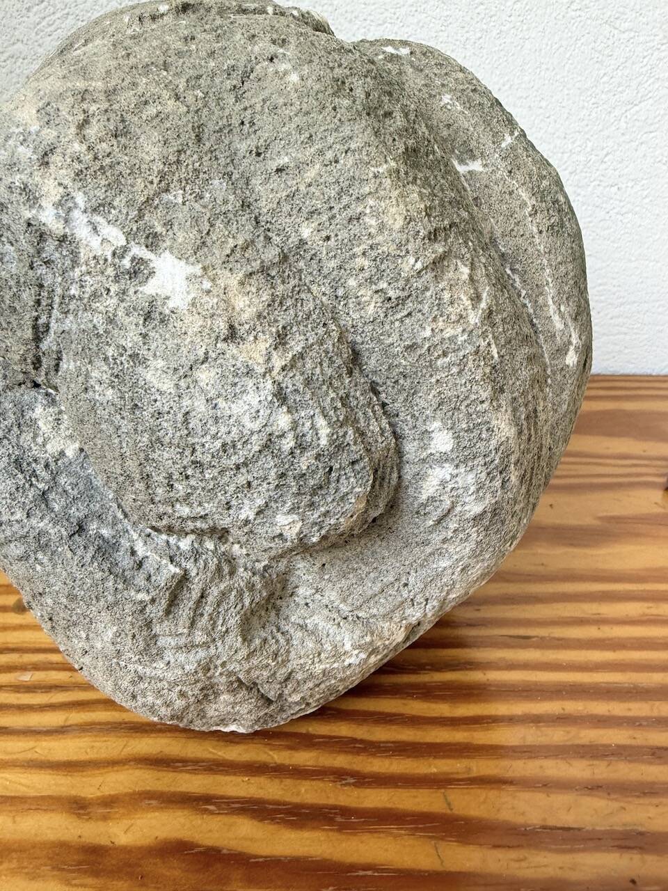 Stone sculpture of a man