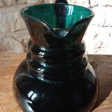 Deep green jug or pitcher with modern design - thick glass