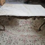 Coffee table with brass structure and marble top