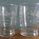 Old digestif or liqueur glasses, handcrafted glass with a floral pattern.