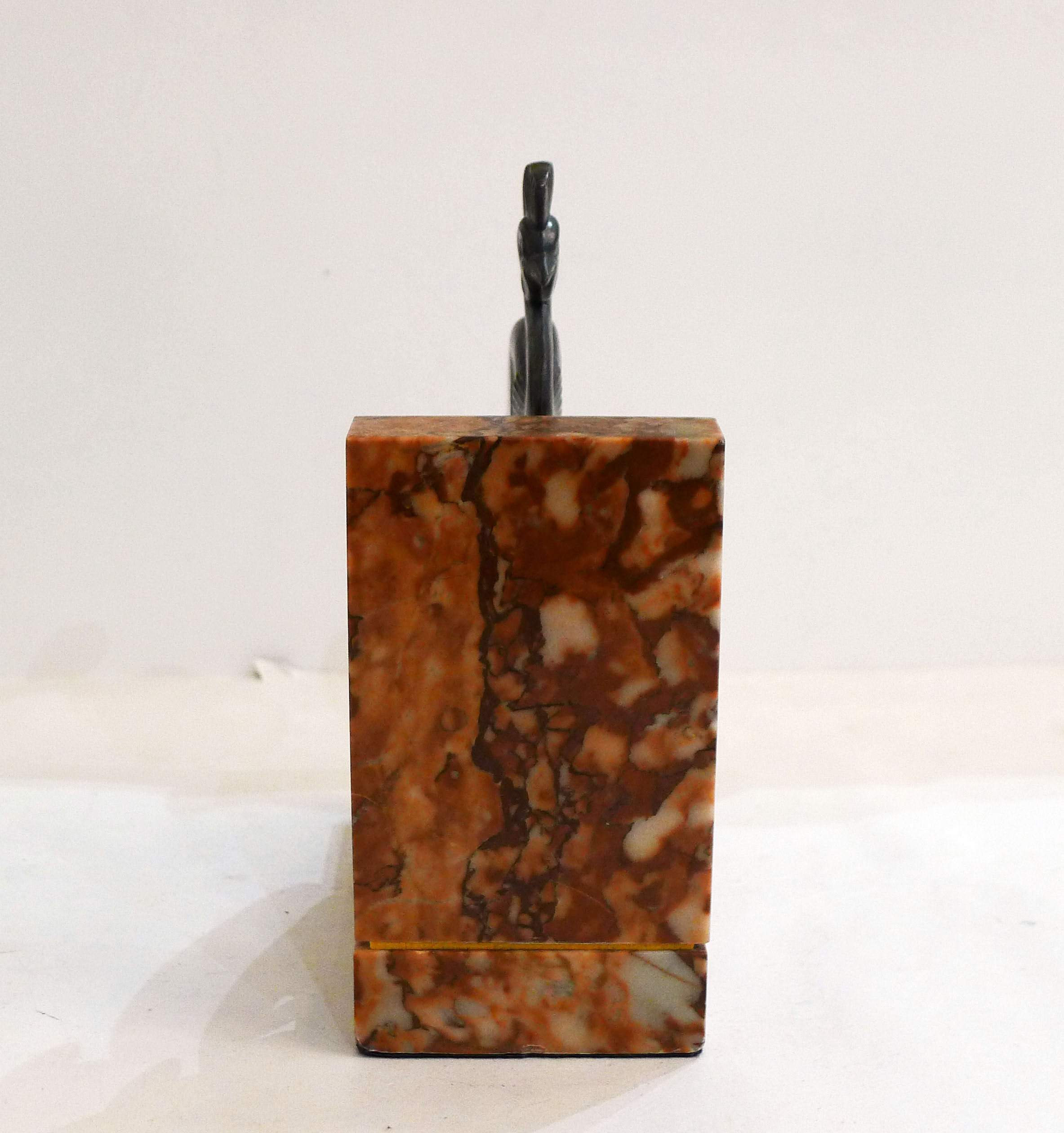 Art Deco bird bookend on marble