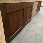An old piece of workshop furniture transformed into a TV stand