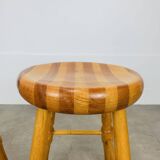 Pair of brutalist solid wood stools