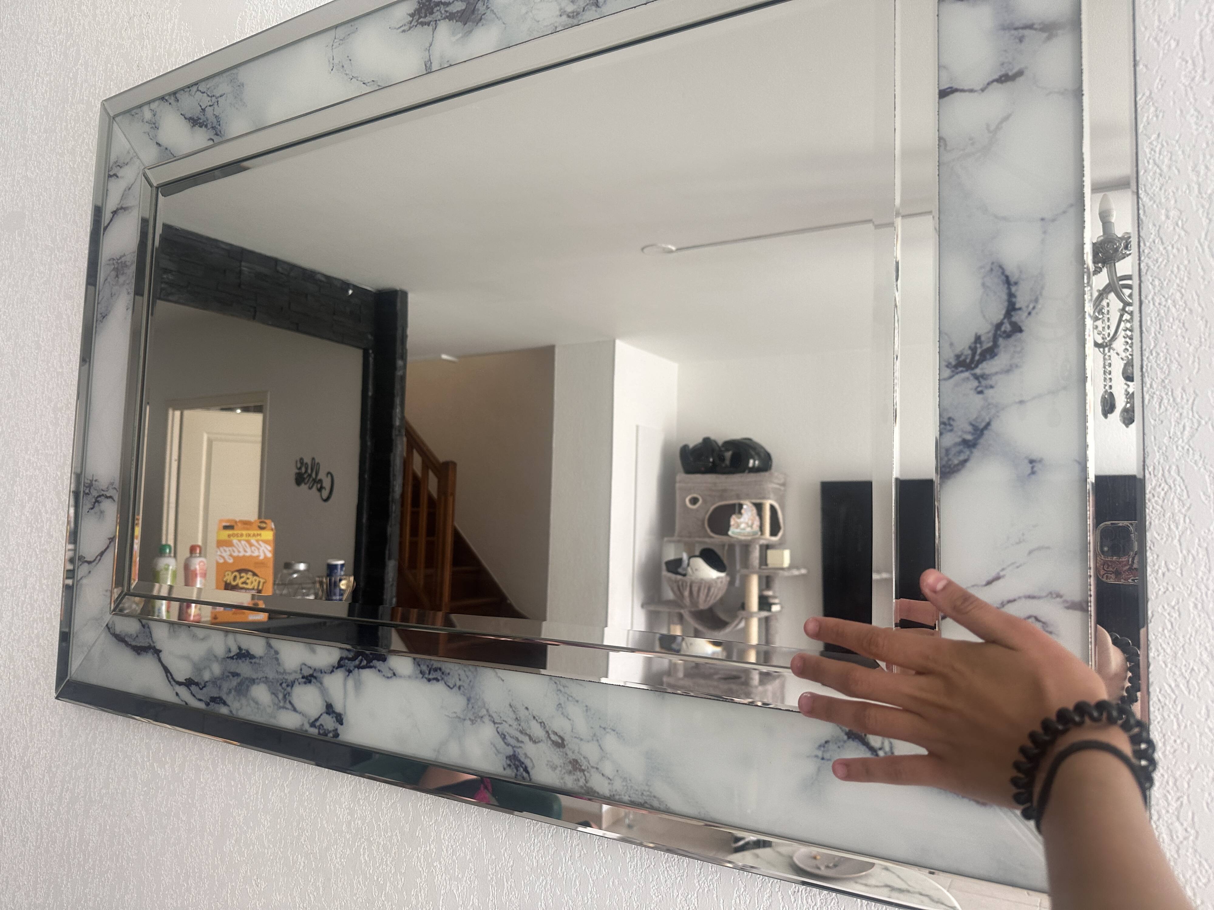 Large marble effect mirror