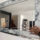 Large marble effect mirror