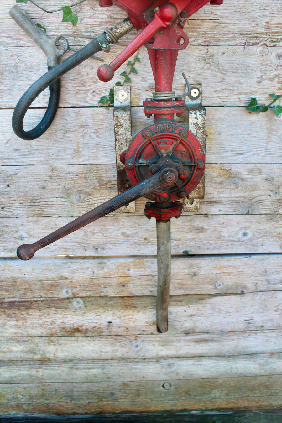 Pair of vintage petrol pumps from the japy brand, 1900