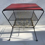 Old coffee table with black metal and scoubidou magazines holder