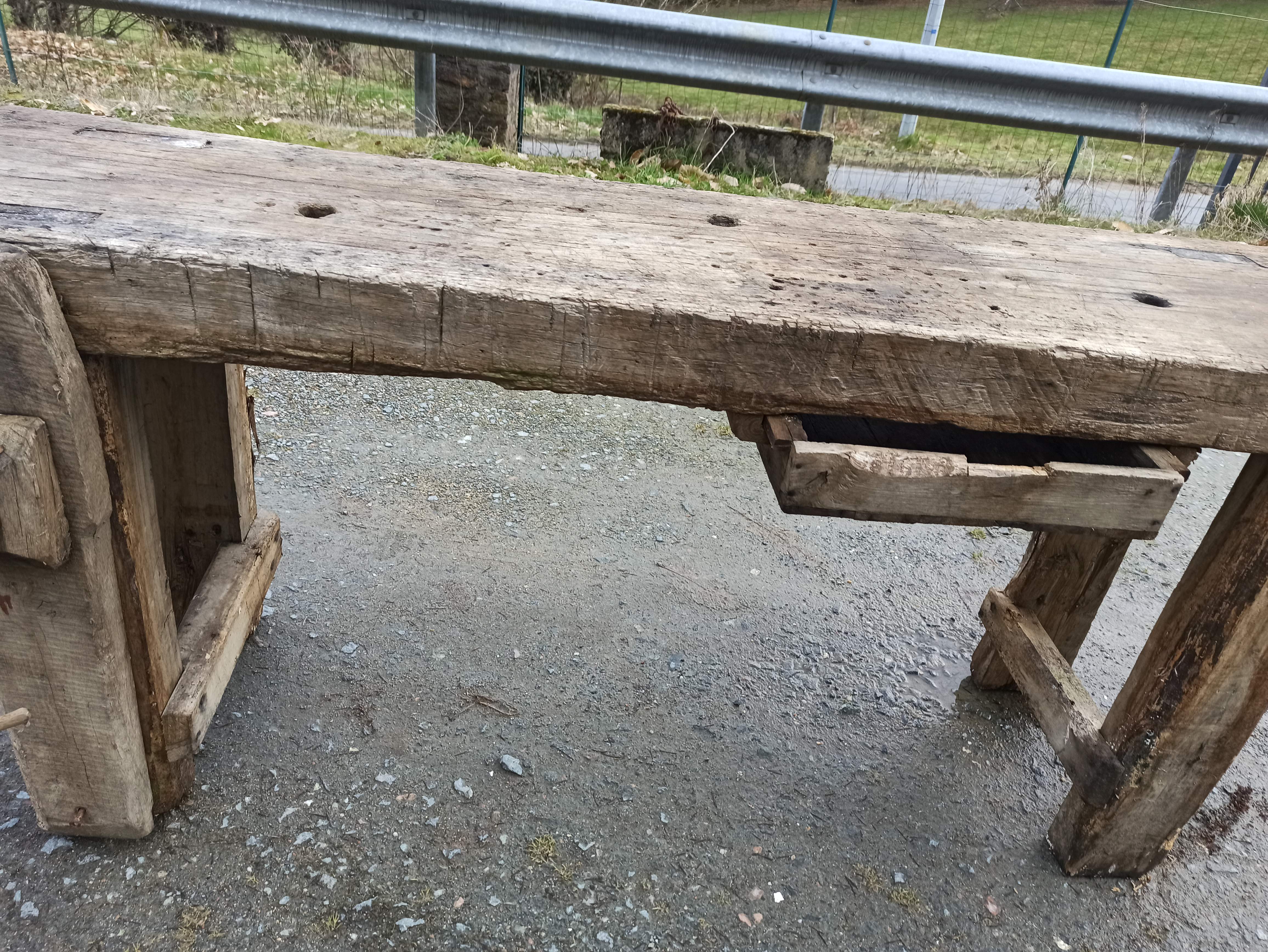 Old wooden workbench furniture by trade with vice