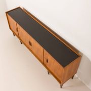 Itaian mid century teak sideboard with black glass top and inlays, 1970s