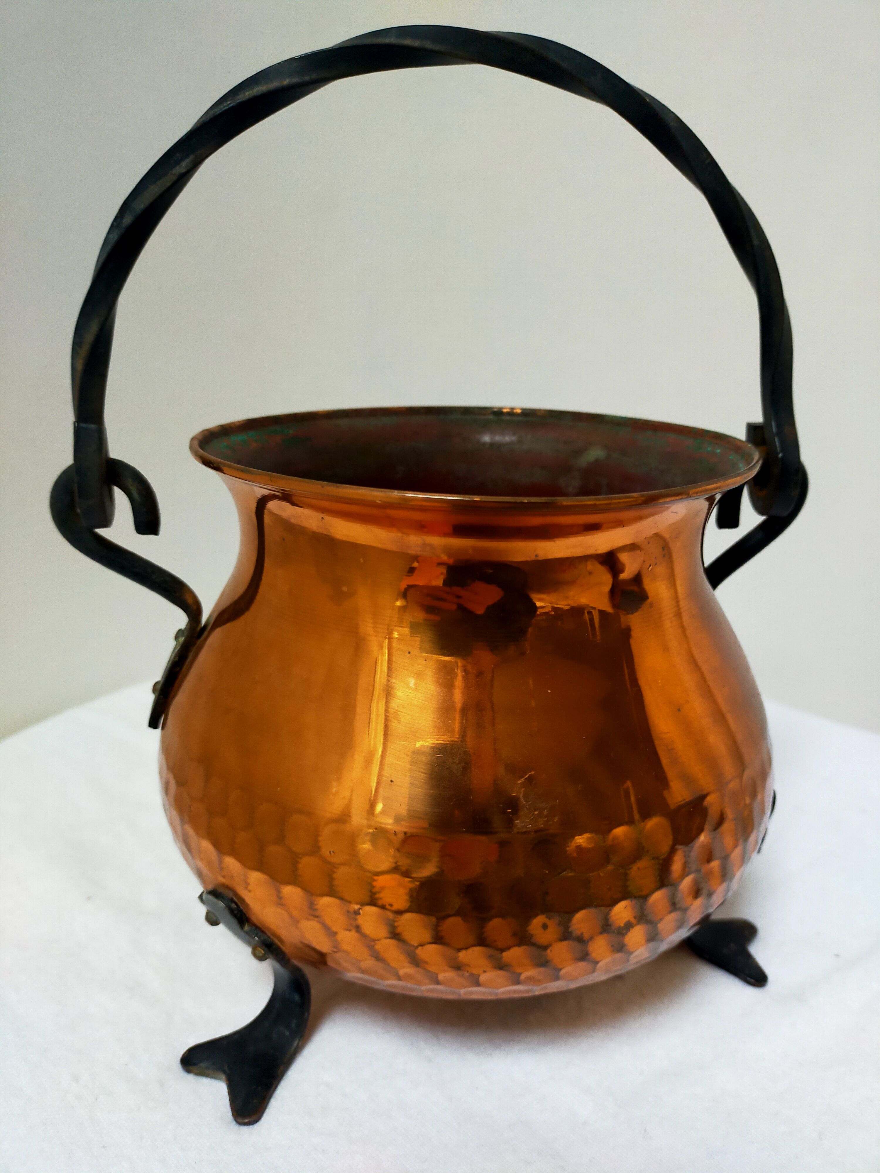 Copper cauldron on feet