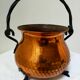 Copper cauldron on feet