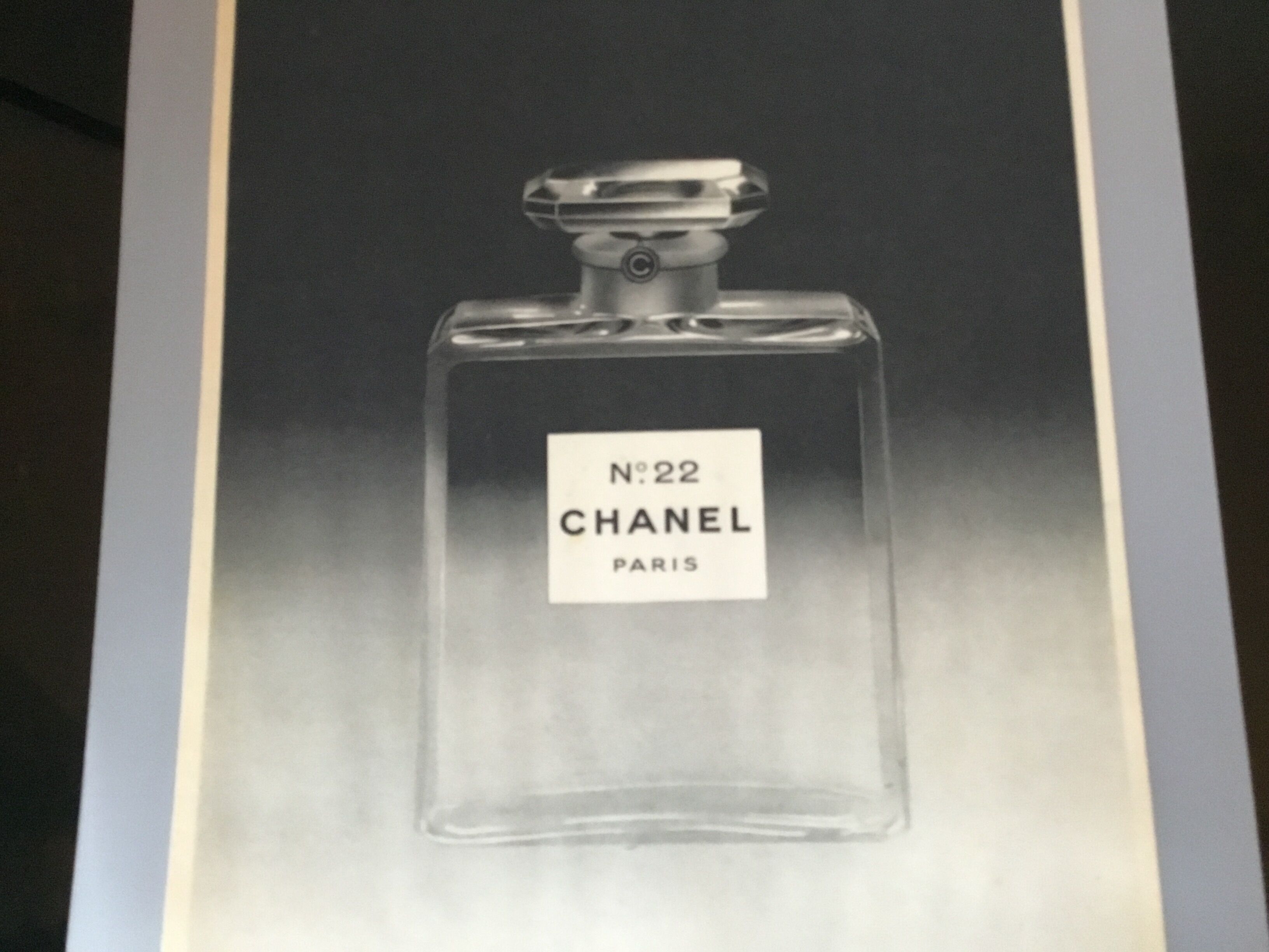 Vintage advertising to frame Chanel n22