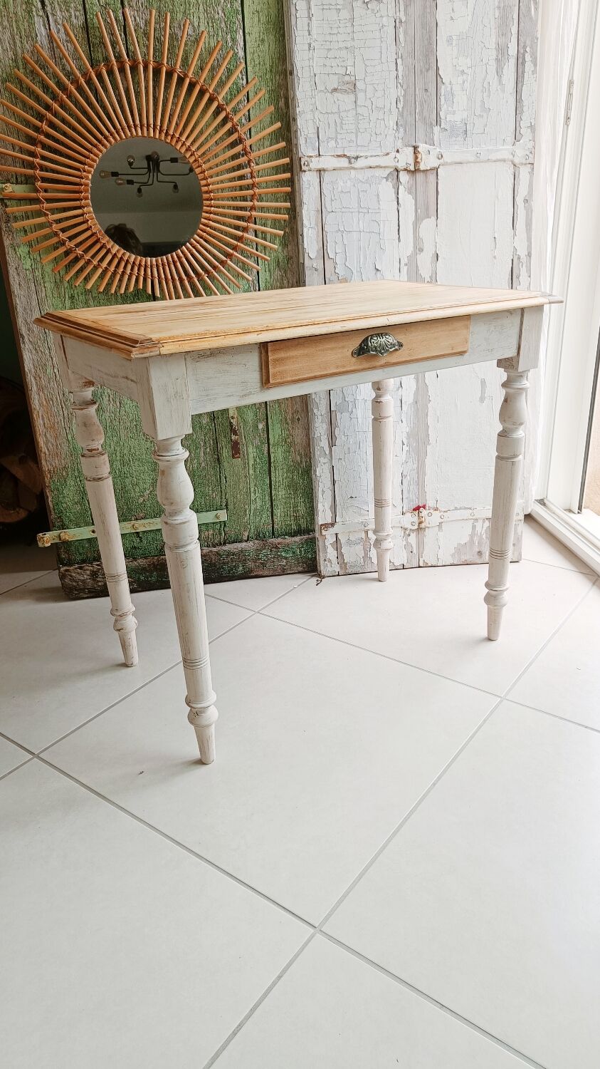 Antique wooden desk with a patinated base