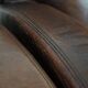 Characterful set of two vintage sheepskin armchairs with beautiful colours