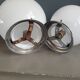 Pair of ceiling lights or wall lights with white glass globes.