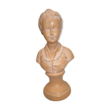 Old bust of a child in platre