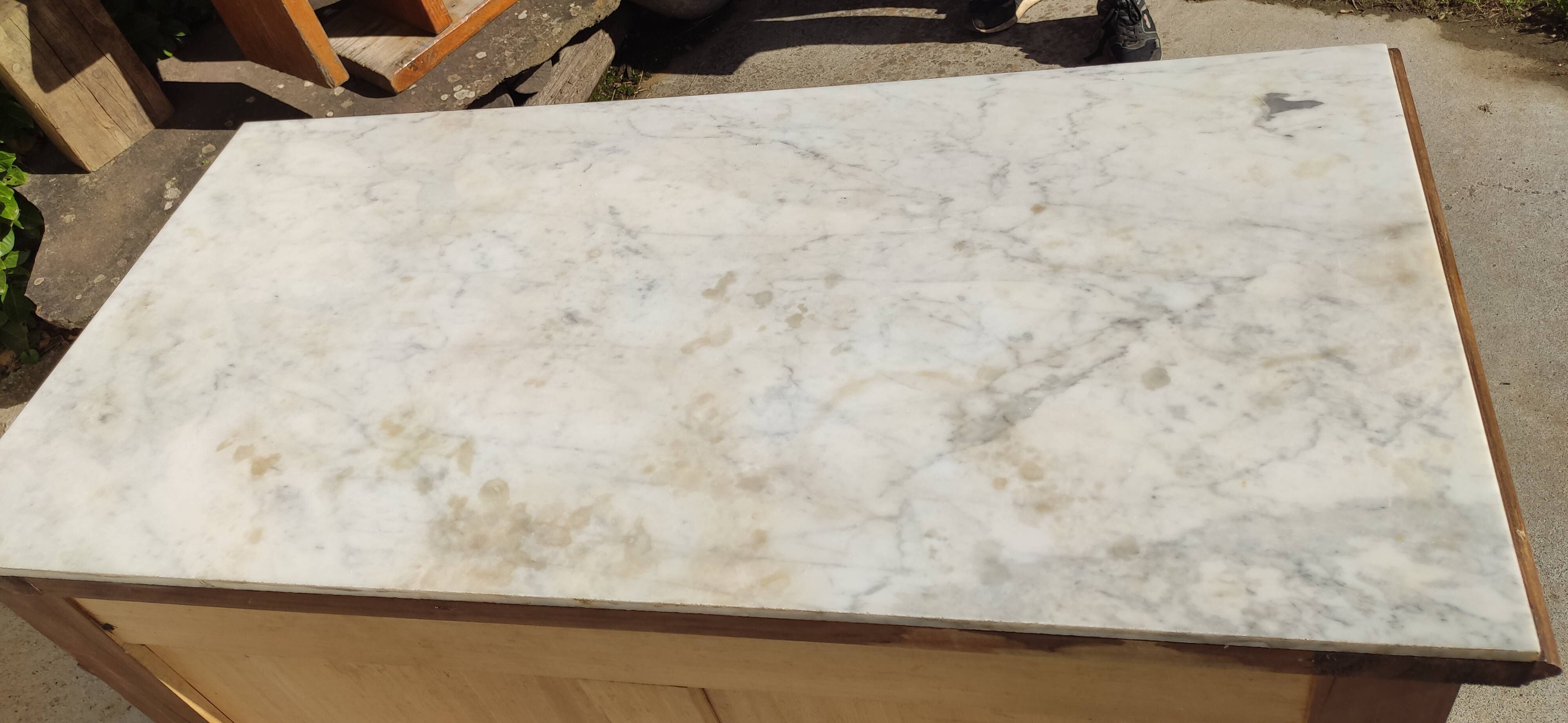 Old chest of drawers, white marble top.
