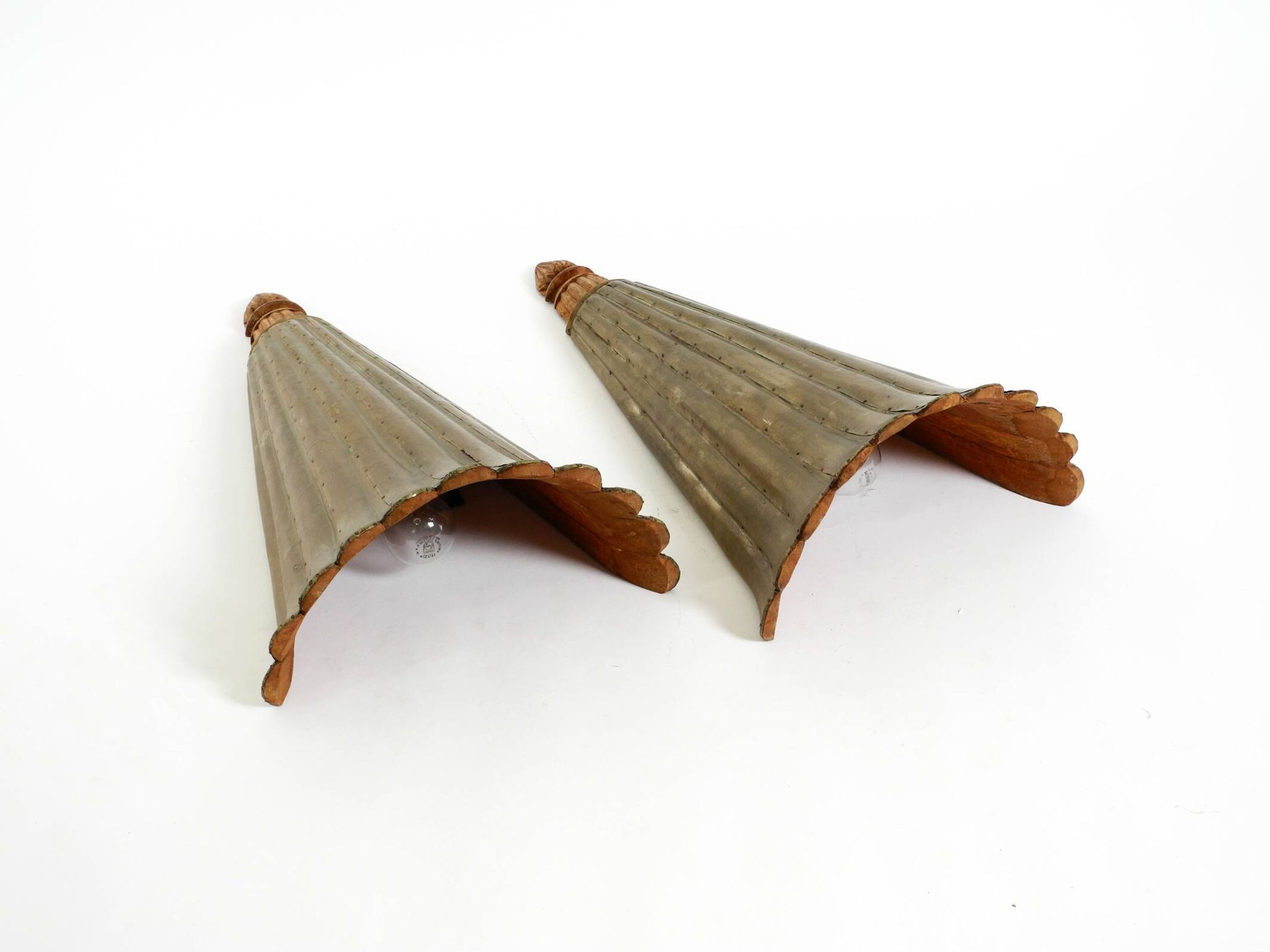 Two large, rare 1950s wall lamps made of wood with aluminum cladding