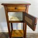 Provincial oak furniture, marble top, ceramic interior.