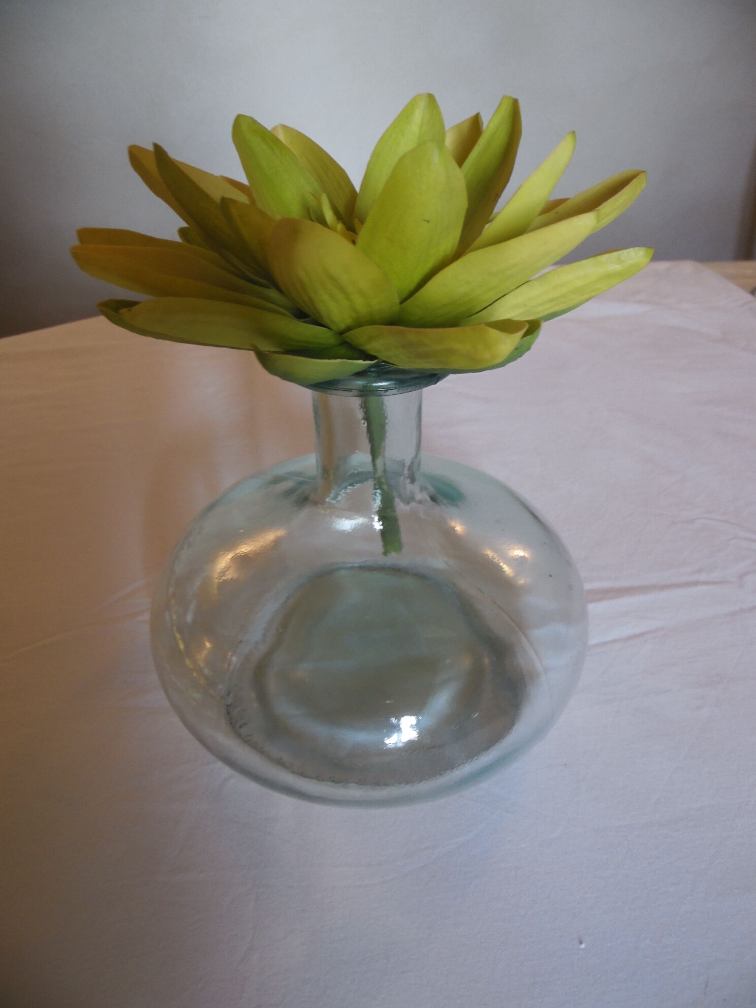 Pale green transparent glass flattened sphere shape vase