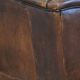 Wing chair made of sheepskin and neatly finished with black piping