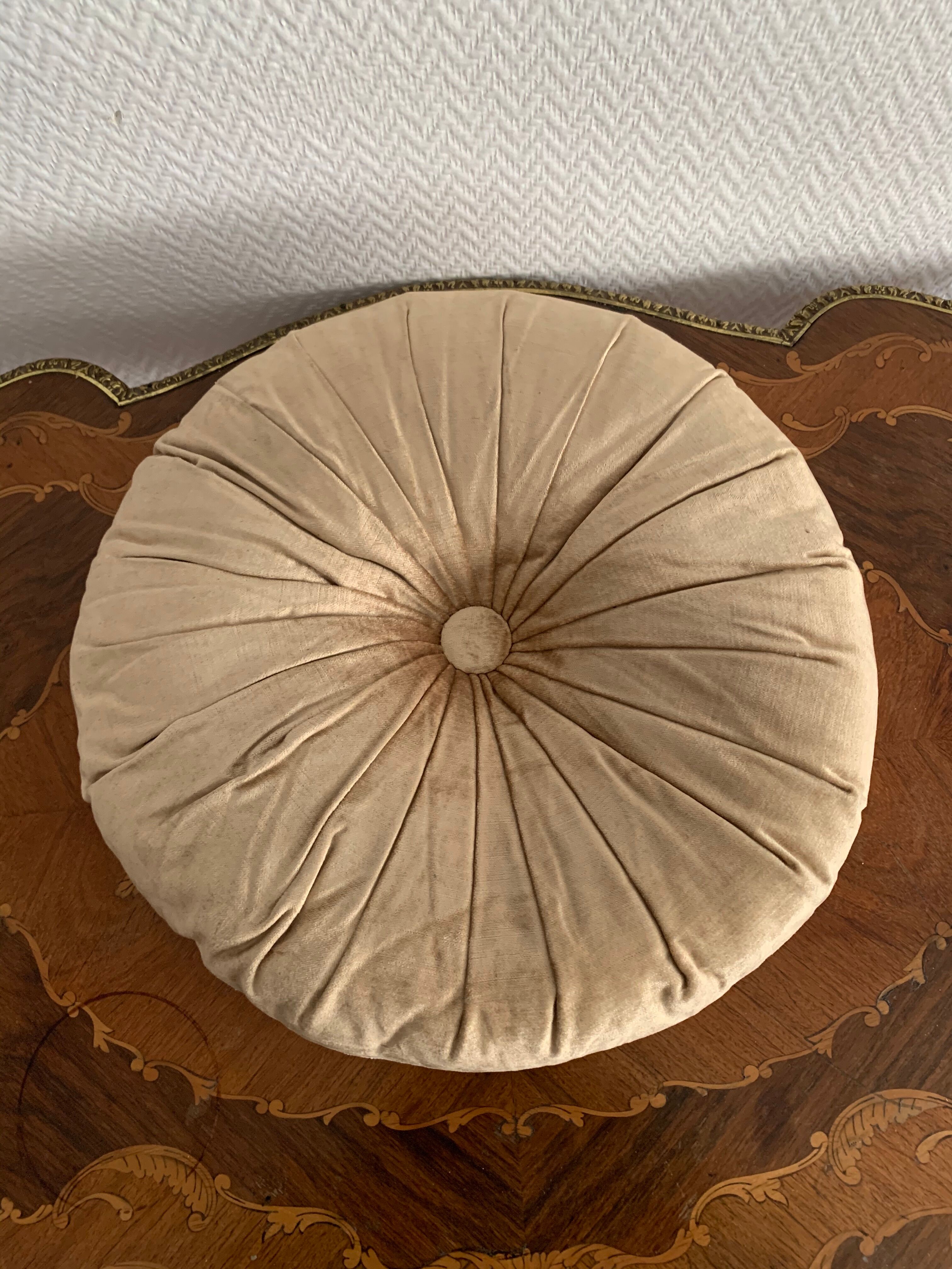 Gold lamé round velvet cushion