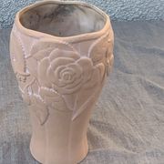 Terracotta vase with a vintage ceramic relief rose pattern