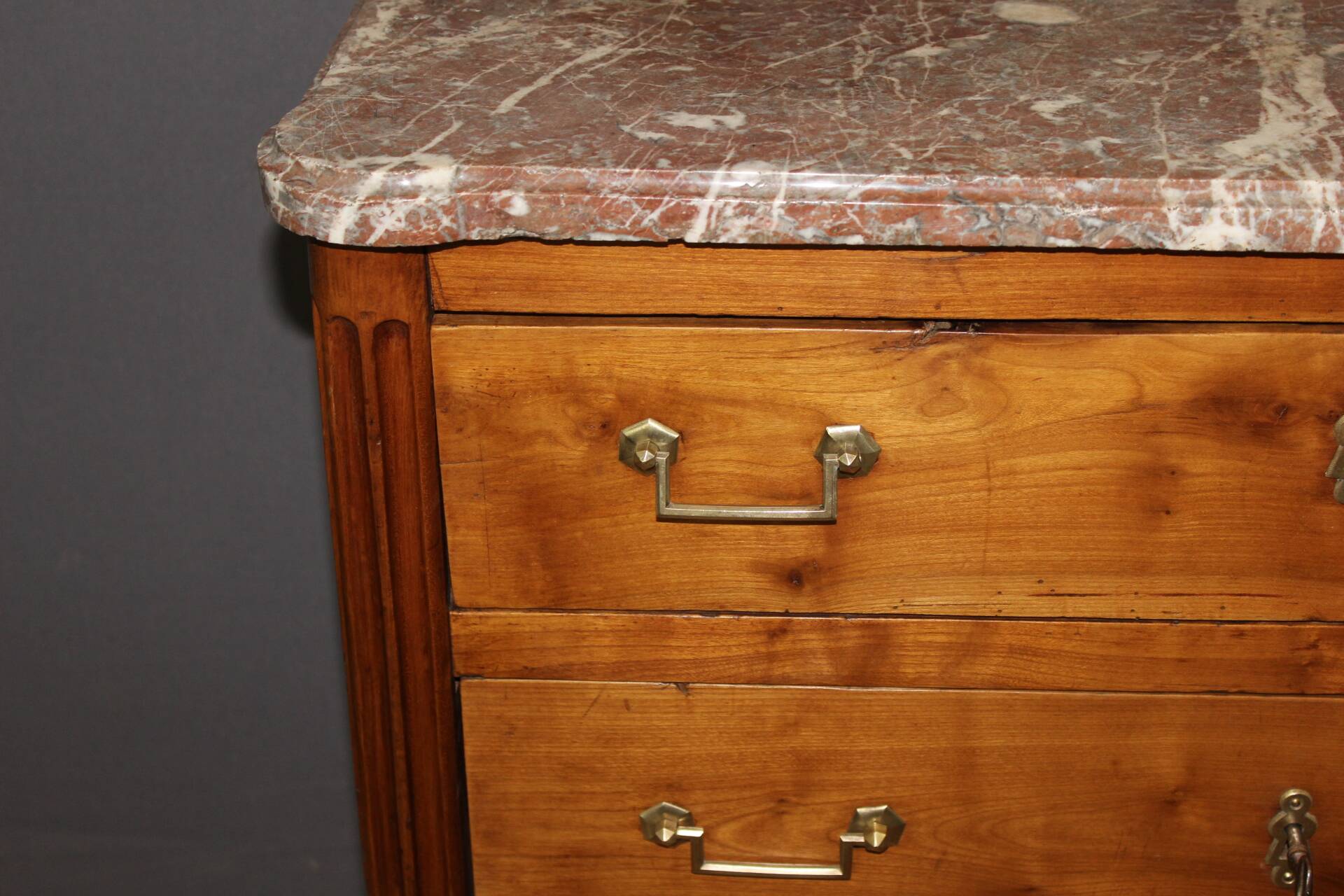 Louis XVI commode in cherry wood, 18th century.