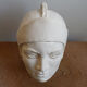Woman's head in plaster