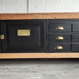 Old workbench furniture with six drawers and a door